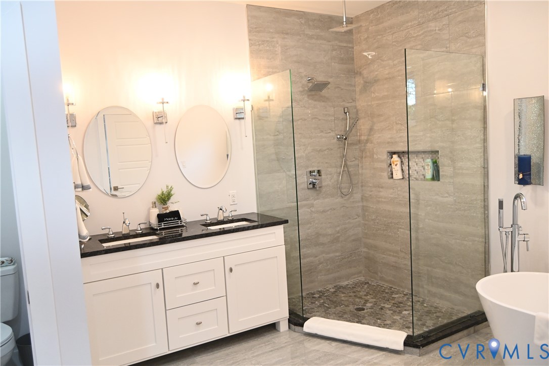 2721 Terminal Avenue Richmond, VA 23234 - Photo 25 of 30 a bathroom with a double vanity sink mirror and toilet