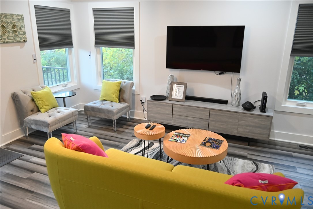 2721 Terminal Avenue Richmond, VA 23234 - Photo 3 of 30 a living room with furniture and a flat screen tv