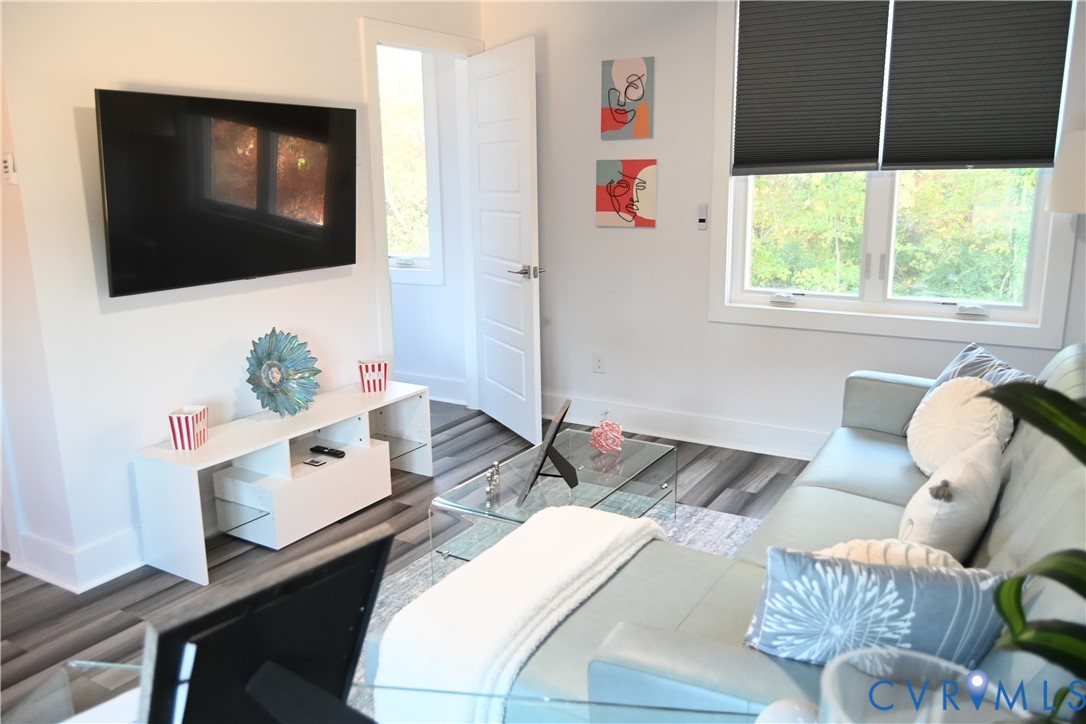 2721 Terminal Avenue Richmond, VA 23234 - Photo 9 of 30 a living room with furniture and a flat screen tv