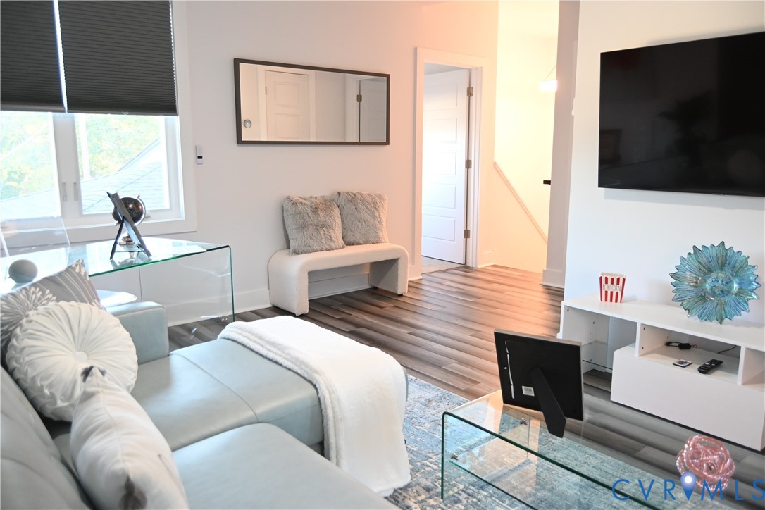 2721 Terminal Avenue Richmond, VA 23234 - Photo 10 of 30 a bedroom with a bed and a flat screen tv