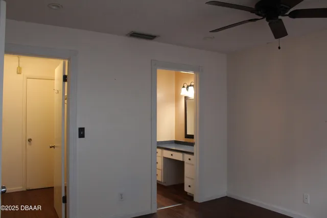 a room with closet and a window