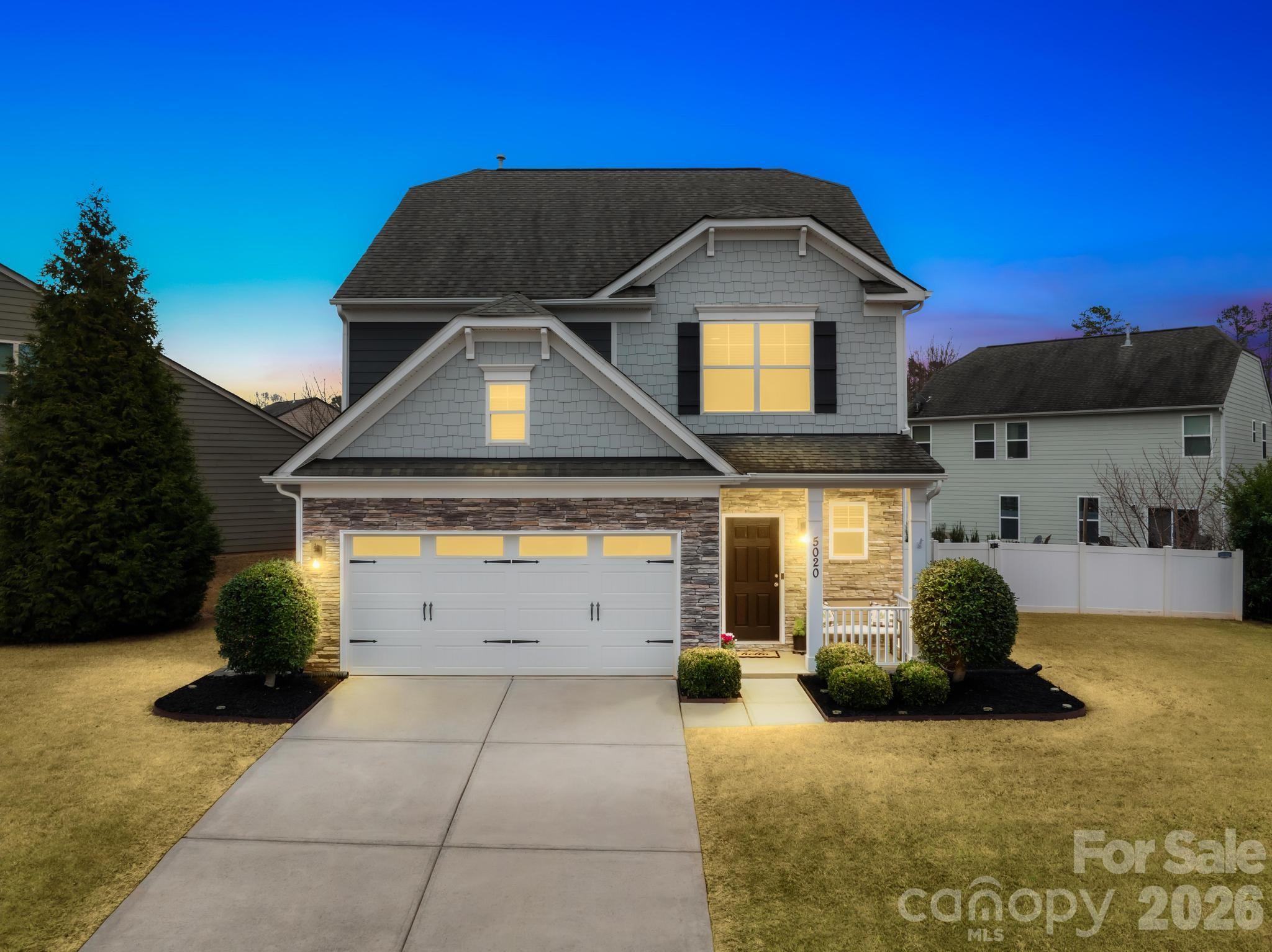 5020 Fenwick Court Lancaster, SC 29720 - Photo 1 of 46 a front view of a house with a garage