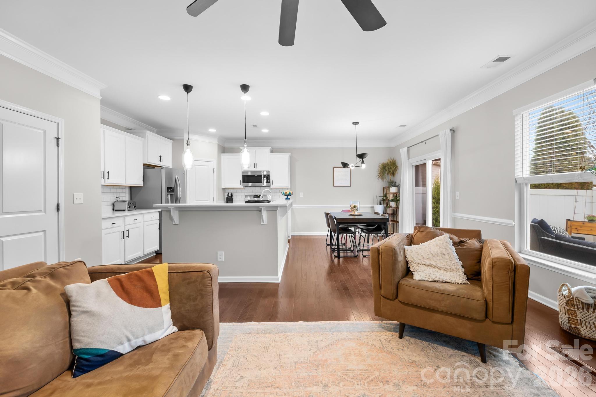 5020 Fenwick Court Lancaster, SC 29720 - Photo 13 of 46 a living room with furniture and kitchen view