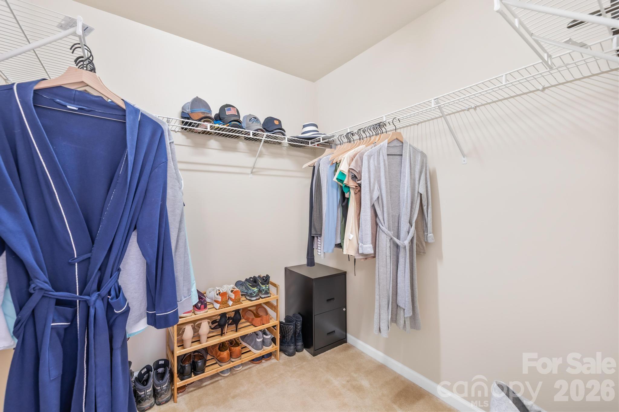 5020 Fenwick Court Lancaster, SC 29720 - Photo 21 of 46 a view of walk in closet with clothes and shoes