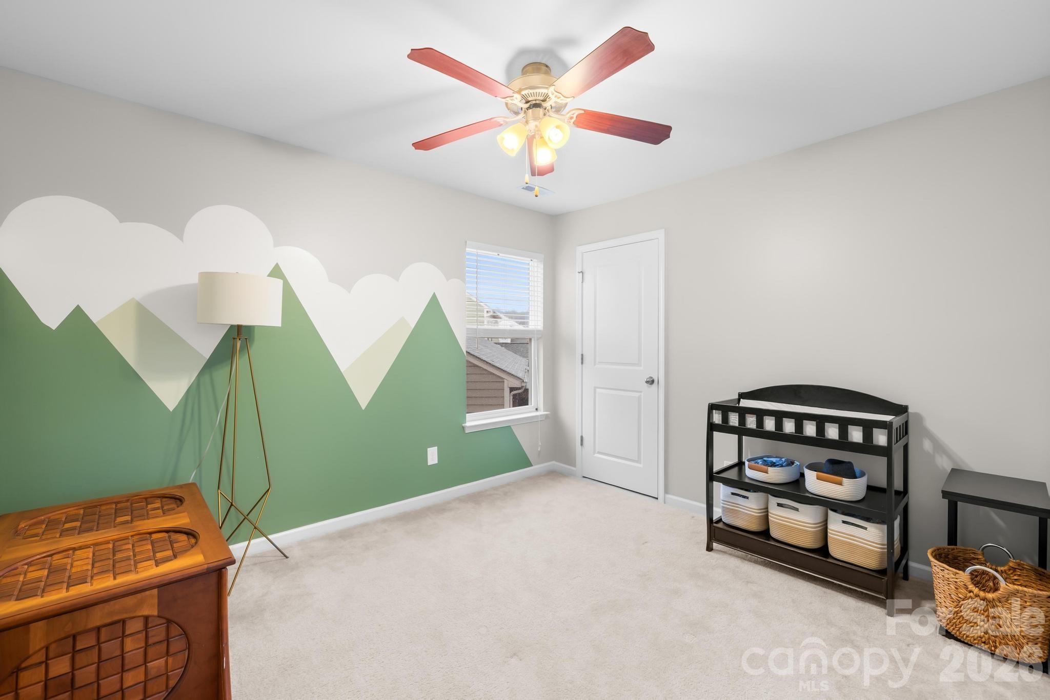 5020 Fenwick Court Lancaster, SC 29720 - Photo 23 of 46 a living room with furniture and a ceiling fan