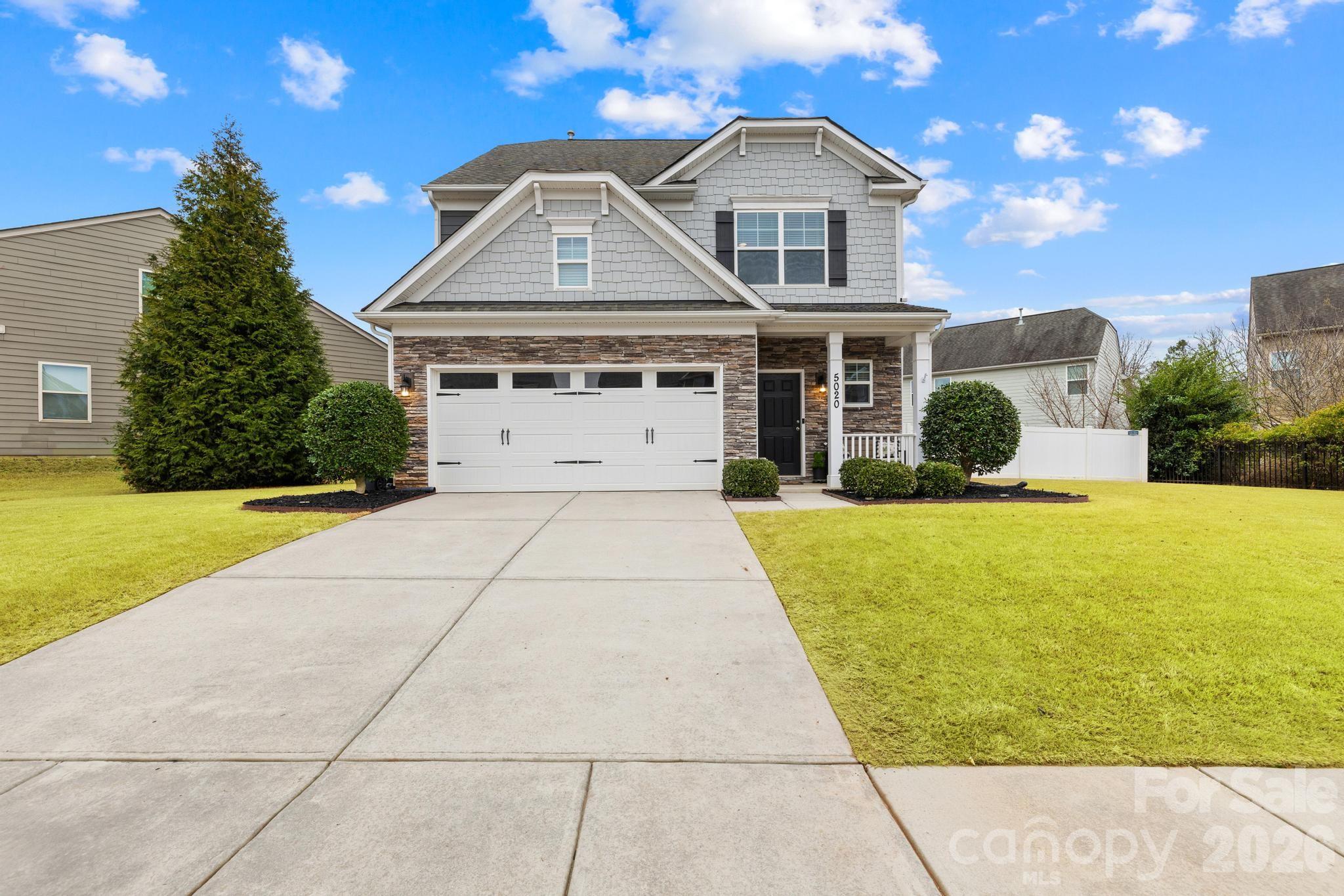 5020 Fenwick Court Lancaster, SC 29720 - Photo 30 of 46 a front view of a house with yard