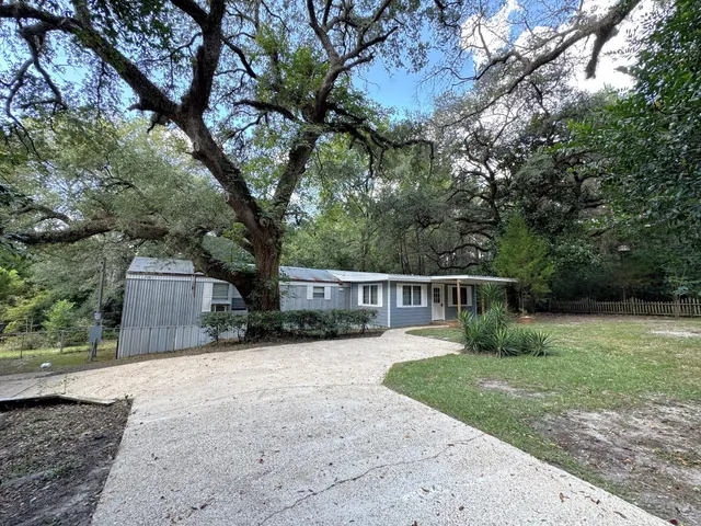 a house view with a garden space