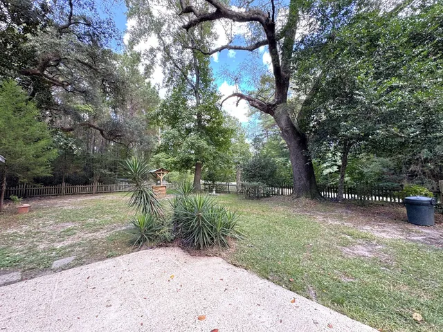 a view of backyard with outdoor space