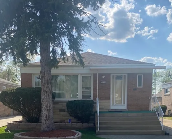 a front view of house with yard