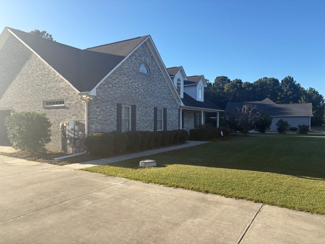 6041 Bear Bluff Road Conway, SC 29526 - Photo 3 of 50 Left side of home