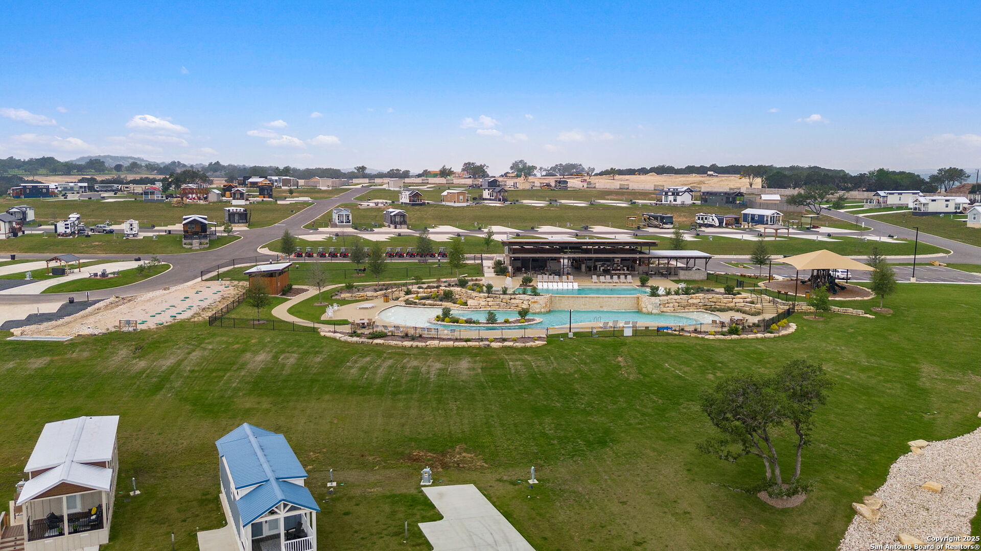 5386 Ranch Road 1376, Unit 114 Fredericksburg, TX 78624 - Photo 25 of 29 a view of a lake with a city