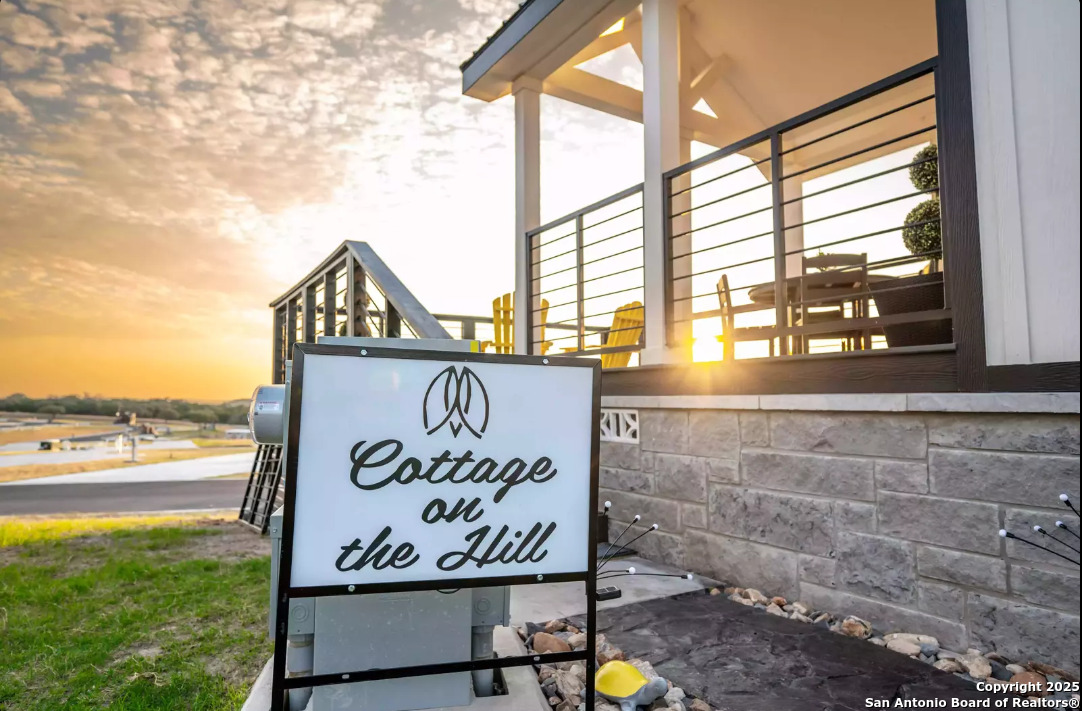 5386 Ranch Road 1376, Unit 114 Fredericksburg, TX 78624 - Photo 5 of 29 a sign on the side of a building