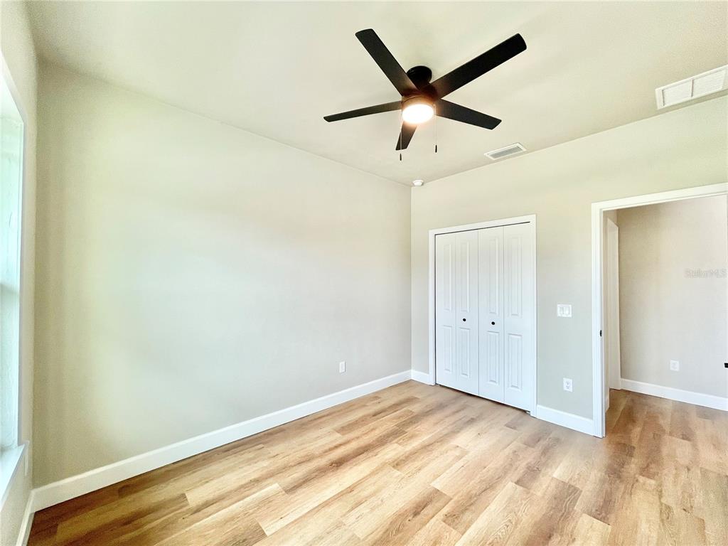 1021 Southwest 67th Street Gainesville, FL 32607 - Photo 28 of 53 a view of a big room with wooden floor
