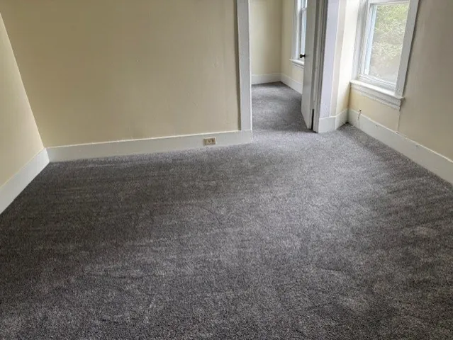 an empty room with windows