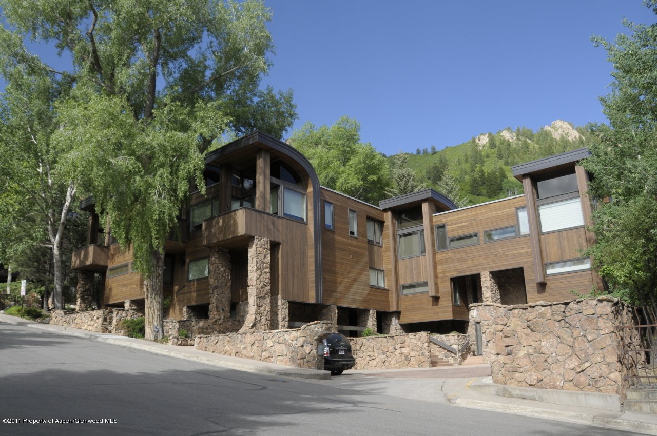 701 South Monarch Street, Unit 2 Aspen, CO 81611 - Photo 1 of 13 a view of road with building in the background