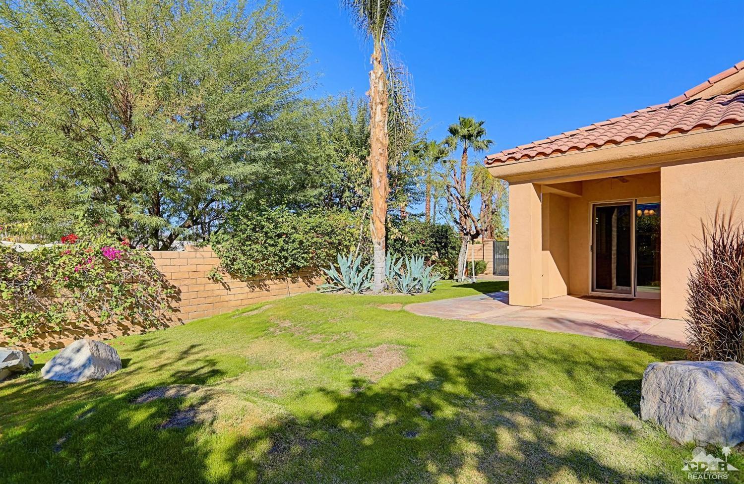 36844 Palm View Road Rancho Mirage, CA 92270 - Photo 46 of 48 a view of a house with backyard and garden