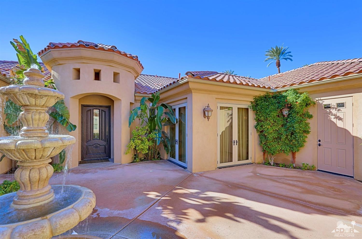 36844 Palm View Road Rancho Mirage, CA 92270 - Photo 9 of 48 a front view of a house with a porch