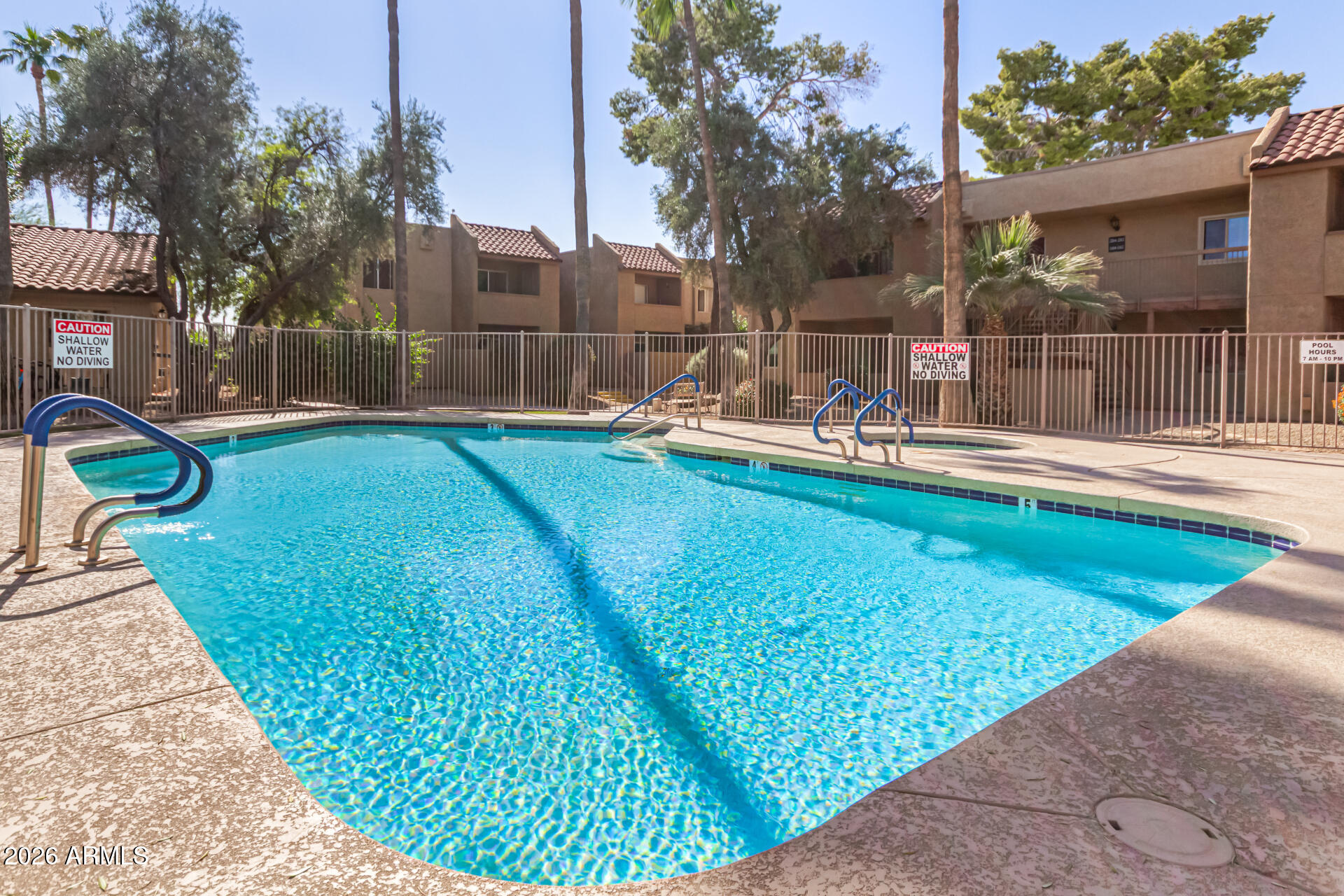 5877 North Granite Reef Road, Unit 1133 Scottsdale, AZ 85250 - Photo 29 of 33 a view of backyard with swimming pool and seating space