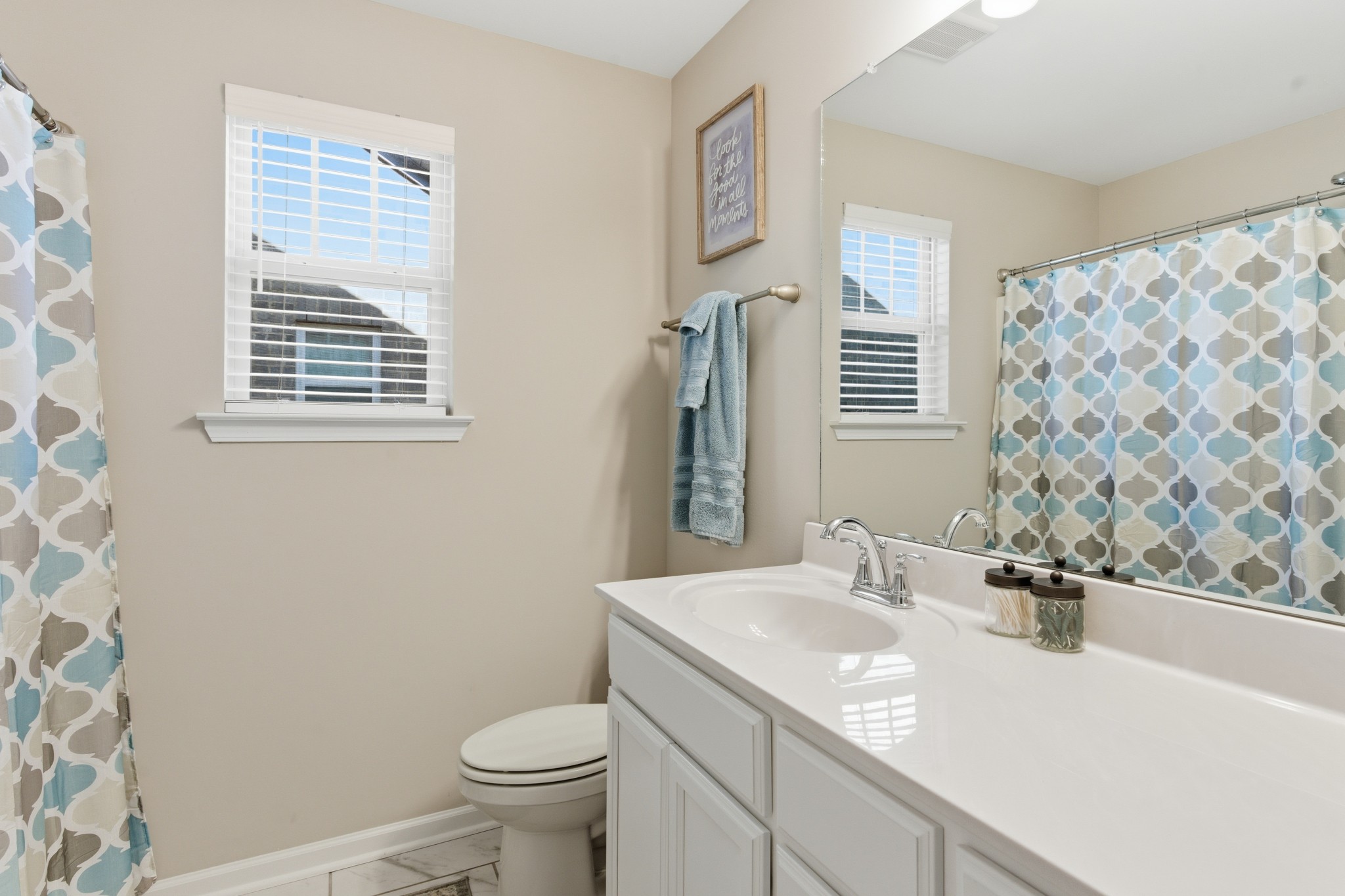 140 Rising Pvt Lane Gallatin, TN 37066 - Photo 18 of 29 a bathroom with a sink toilet and a mirror