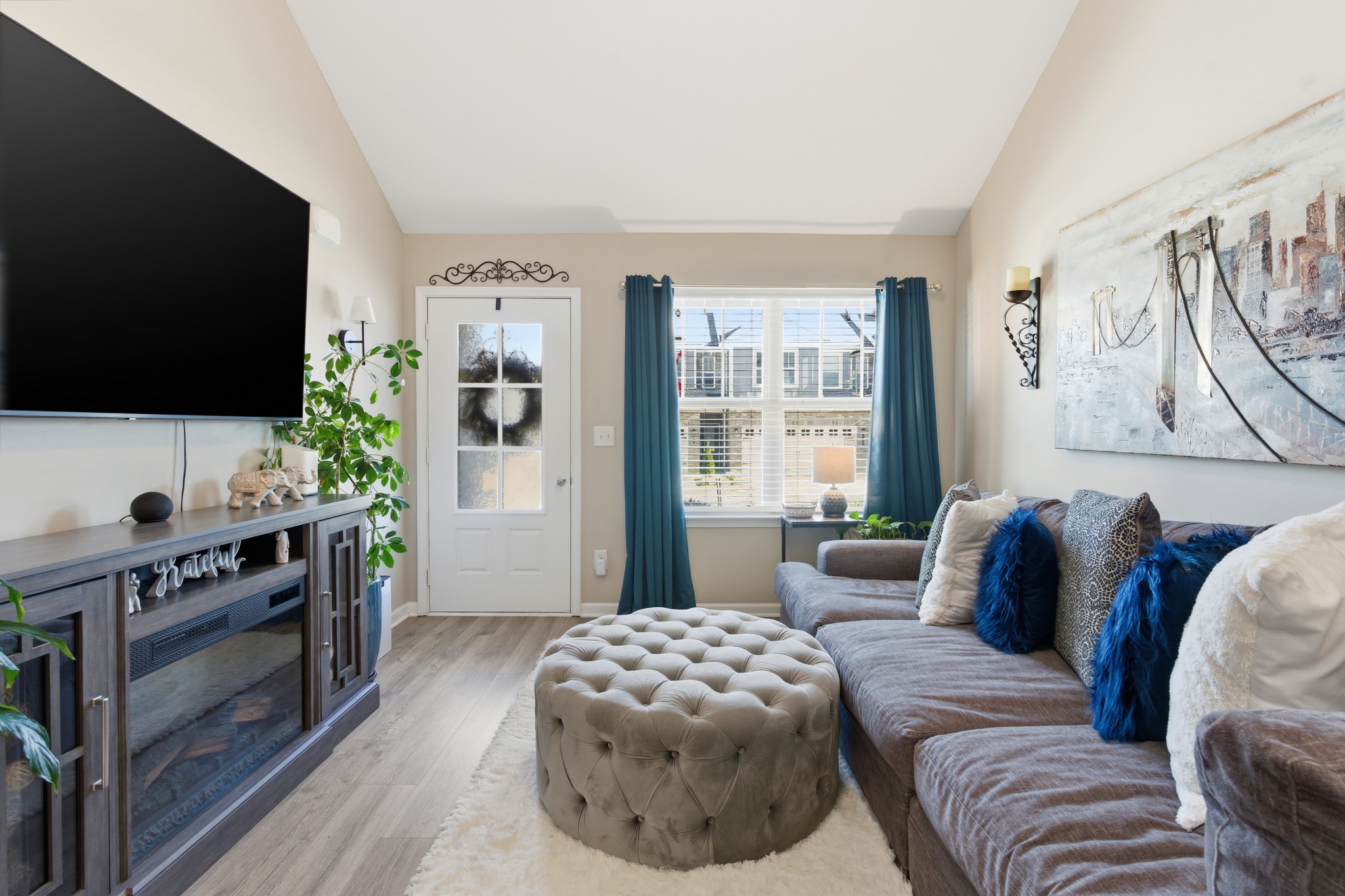 140 Rising Pvt Lane Gallatin, TN 37066 - Photo 4 of 29 a bedroom with furniture and a flat screen tv