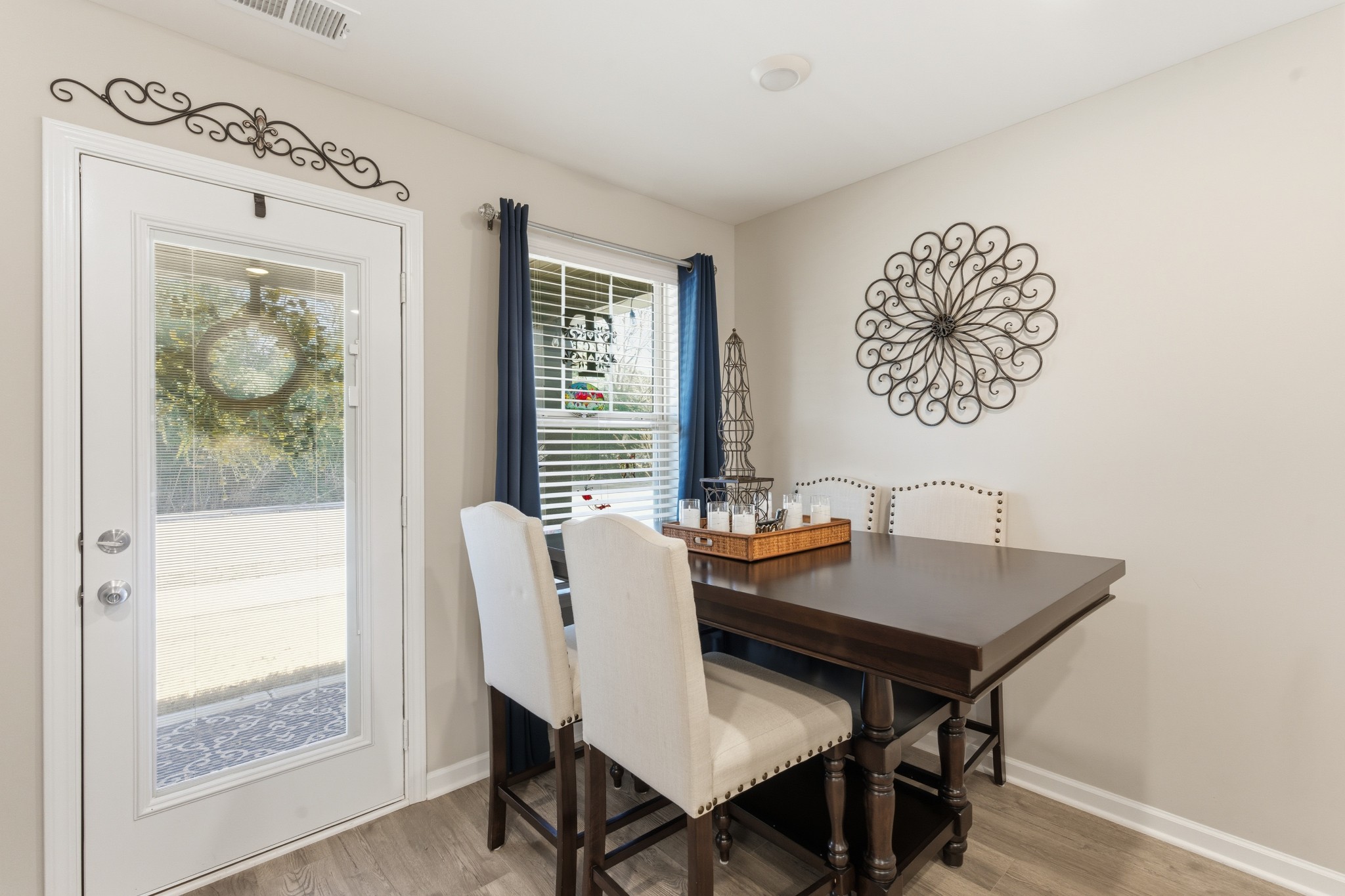 140 Rising Pvt Lane Gallatin, TN 37066 - Photo 8 of 29 a view of a dining room with furniture window and wooden floor