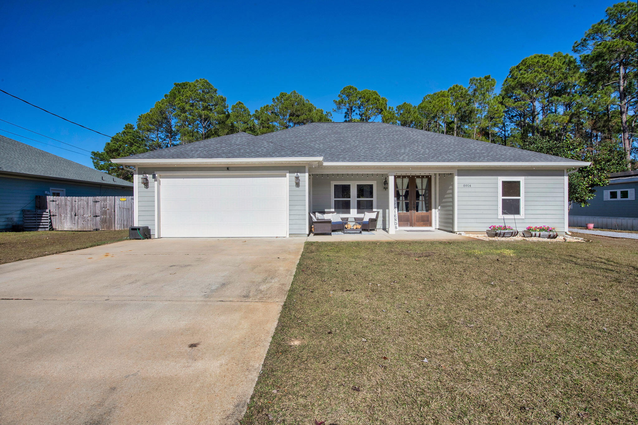 8914 Timber Lane Navarre, FL 32566 - Photo 40 of 40 front view of a house with a yard