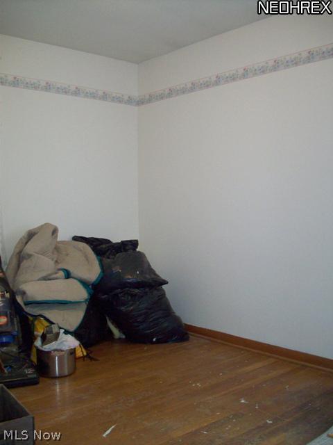 2586 Copley Road Akron, OH 44321 - Photo 10 of 21 Bedroom 1 features hardwood floors and a single closet.