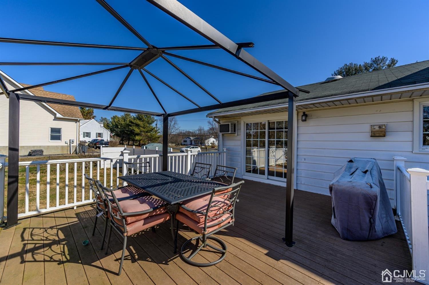 627 Lloyd Road Aberdeen, NJ 07747 - Photo 24 of 32 a view of a two chairs in the deck