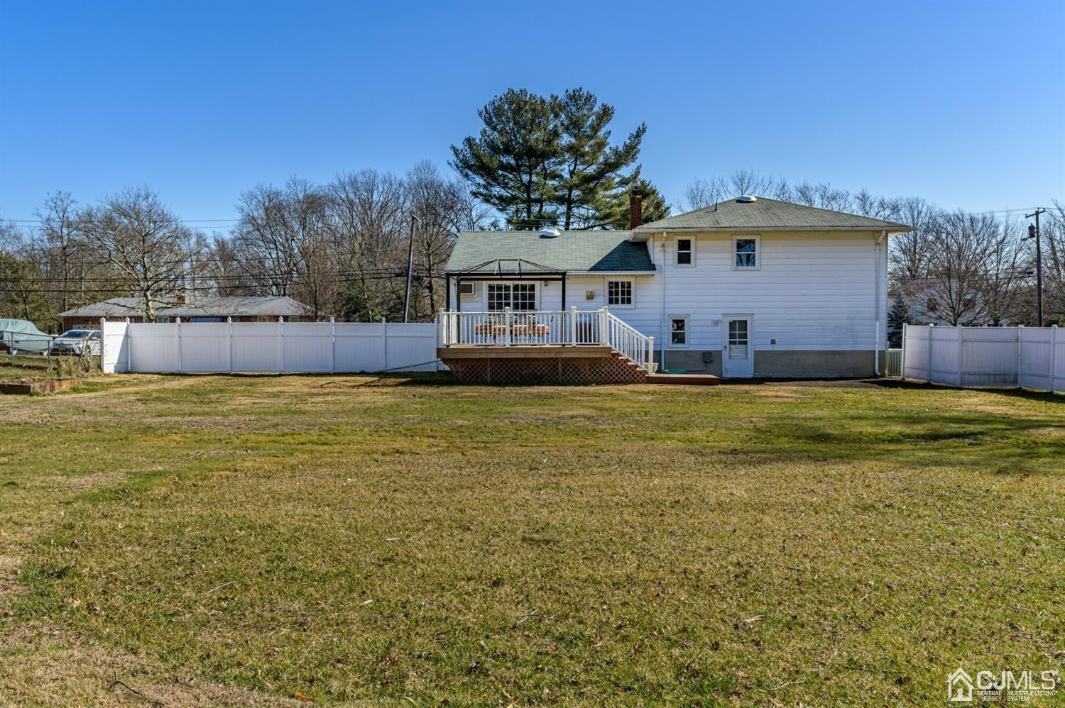 627 Lloyd Road Aberdeen, NJ 07747 - Photo 27 of 32 a view of a house with a yard