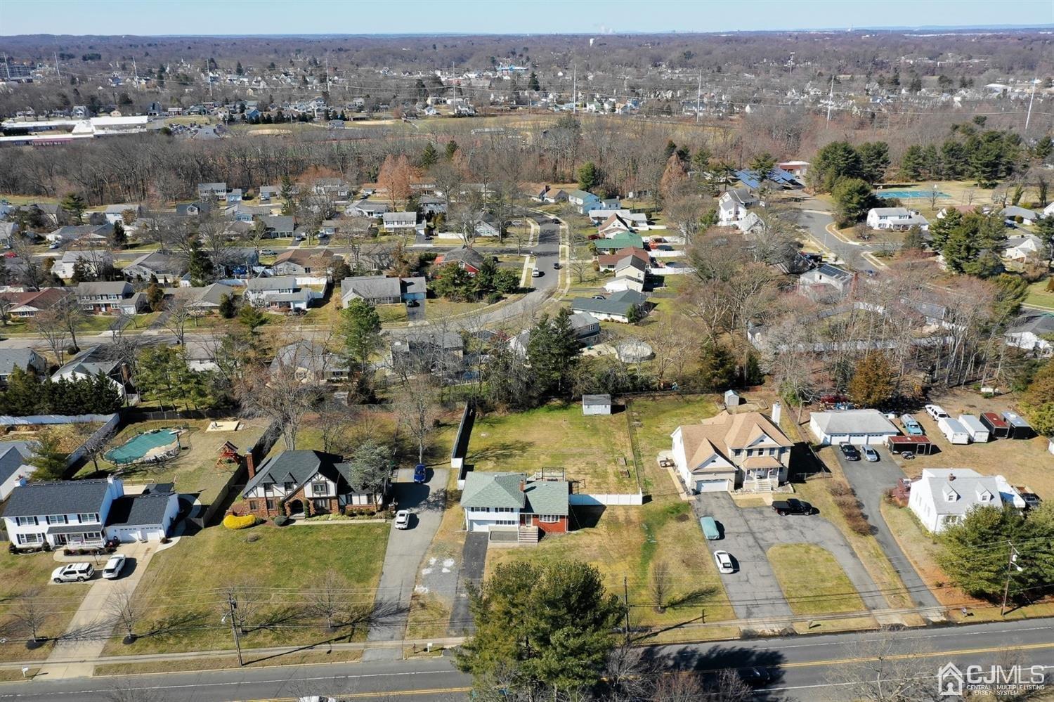 627 Lloyd Road Aberdeen, NJ 07747 - Photo 31 of 32 an aerial view of a city with lots of residential buildings