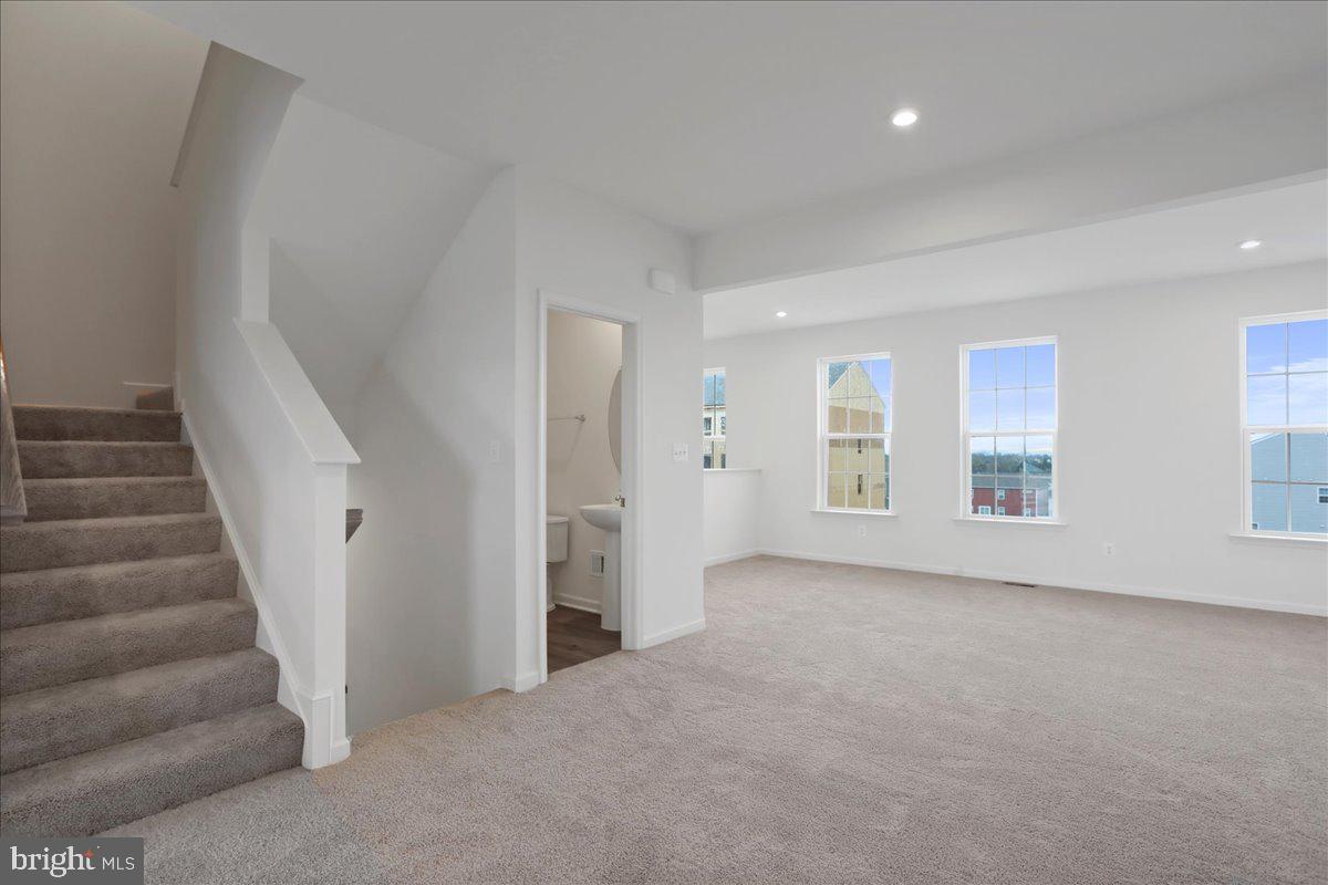 71 Stafford Place Falling Waters, WV 25419 - Photo 21 of 48 a view of an empty room with stairs and ventilation