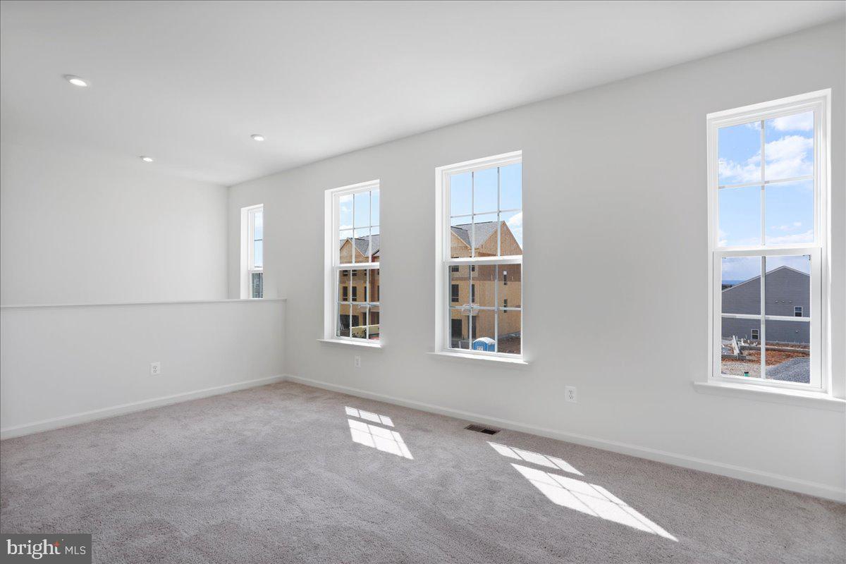 71 Stafford Place Falling Waters, WV 25419 - Photo 23 of 48 a view of an empty room with a window