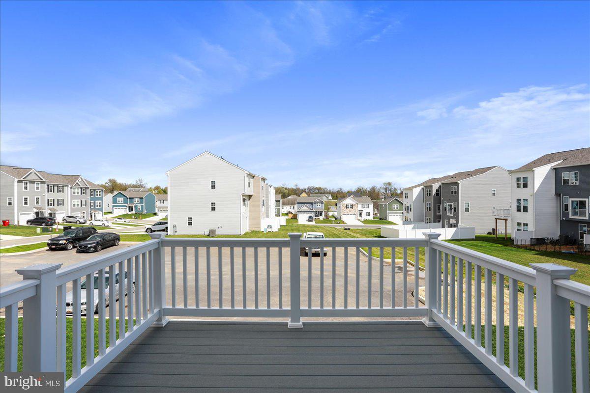 71 Stafford Place Falling Waters, WV 25419 - Photo 26 of 48 a view of city from a balcony