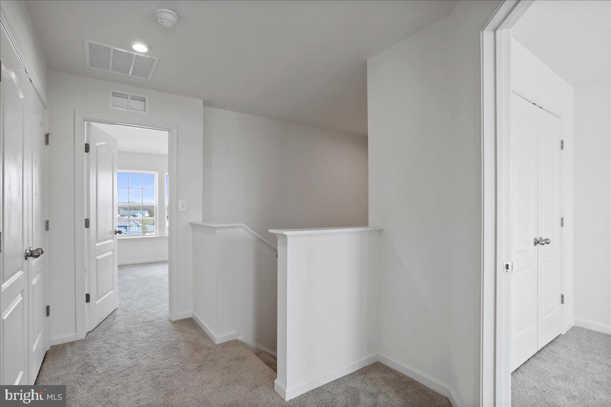 71 Stafford Place Falling Waters, WV 25419 - Photo 27 of 48 a view of a bathroom with a shower and a sink