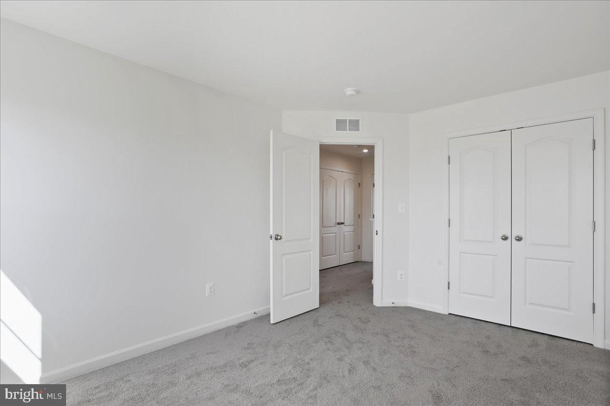 71 Stafford Place Falling Waters, WV 25419 - Photo 29 of 48 a view of an empty room and closet area
