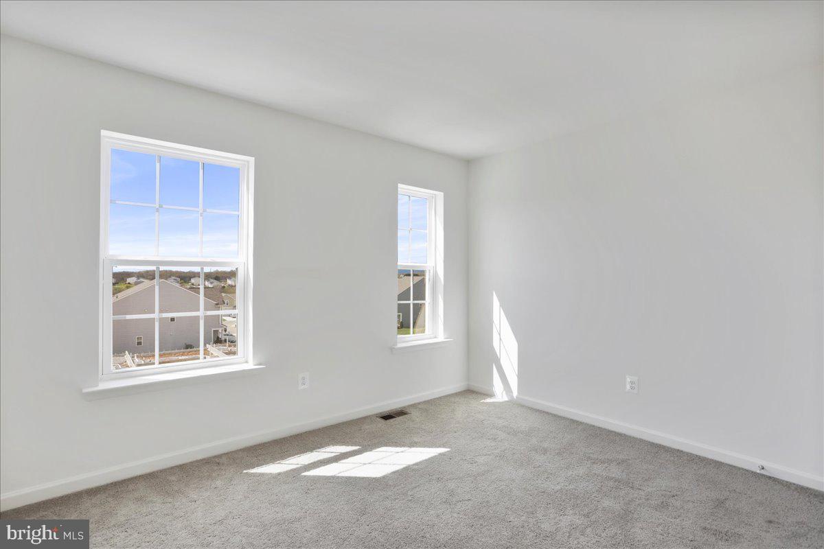 71 Stafford Place Falling Waters, WV 25419 - Photo 31 of 48 an empty room with windows
