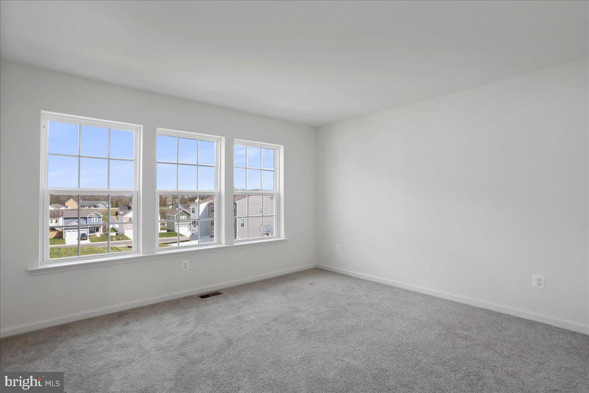 71 Stafford Place Falling Waters, WV 25419 - Photo 34 of 48 an empty room with windows