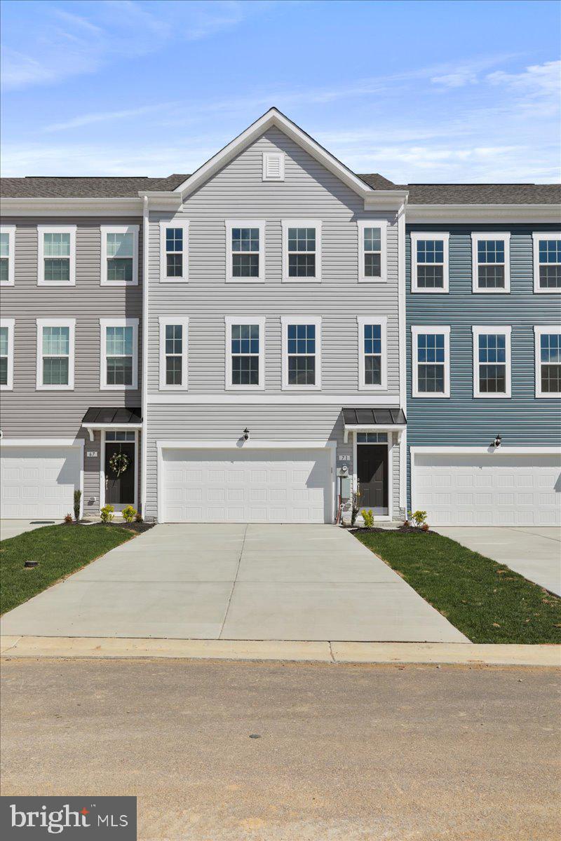 71 Stafford Place Falling Waters, WV 25419 - Photo 4 of 48 a front view of a house with yard