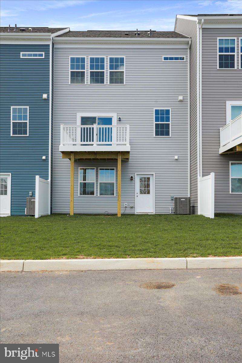71 Stafford Place Falling Waters, WV 25419 - Photo 43 of 48 a house view with a garden space