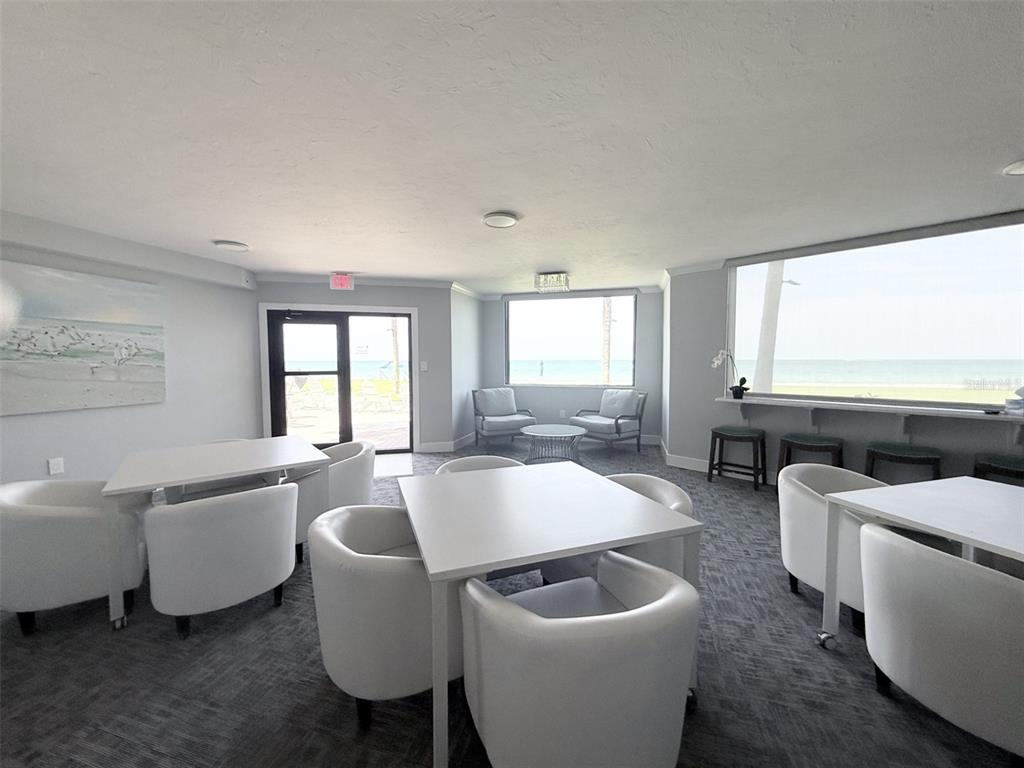 1050 Longboat Club Road, Unit 803 Longboat Key, FL 34228 - Photo 37 of 39 a living room with furniture and a large window