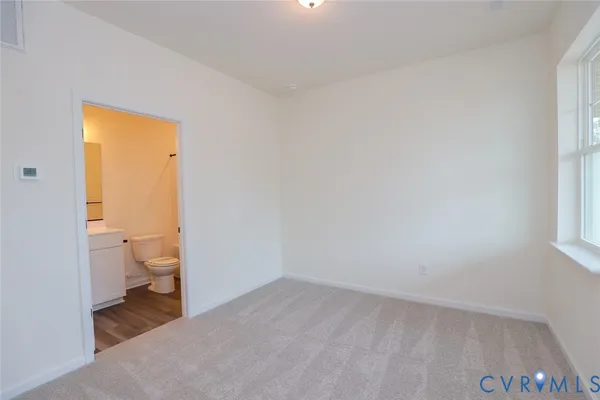 a bathroom with a toilet