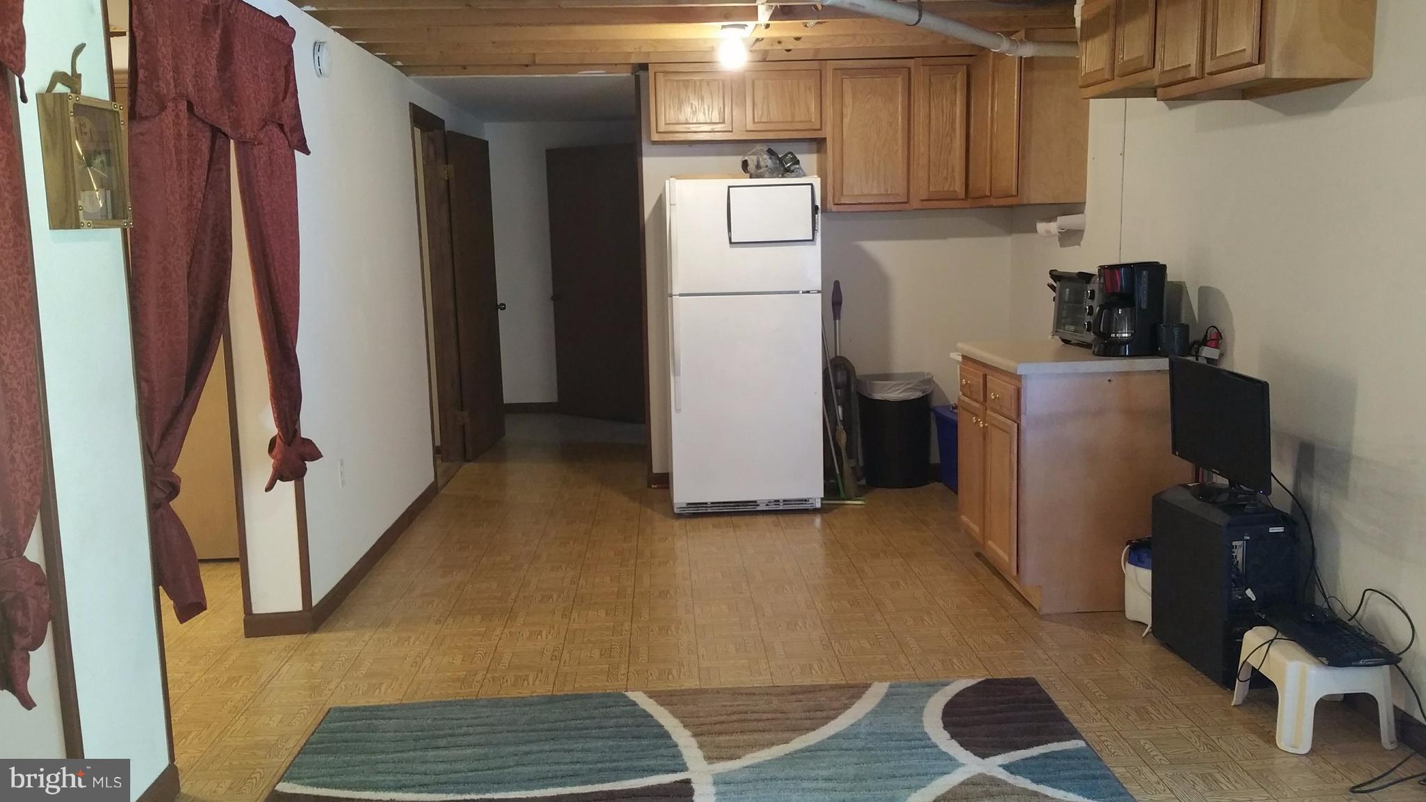 1539 Blue Mountain Road Front Royal, VA 22630 - Photo 19 of 20 Hall leads to utility rm on left and workshop