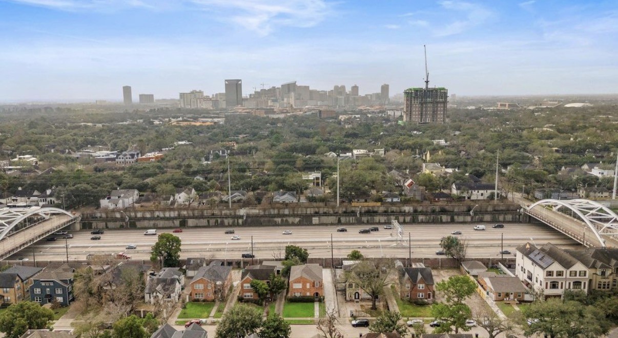 1633 Castle Court Houston, TX 77006 - Photo 24 of 38 Stunning aerial view showcasing the unbeatable central location—just minutes from Downtown, the Medical Center, Museum District, and major highways. Enjoy quick access to Houston’s best dining, parks, and cultural hotspots right at your doorstep.