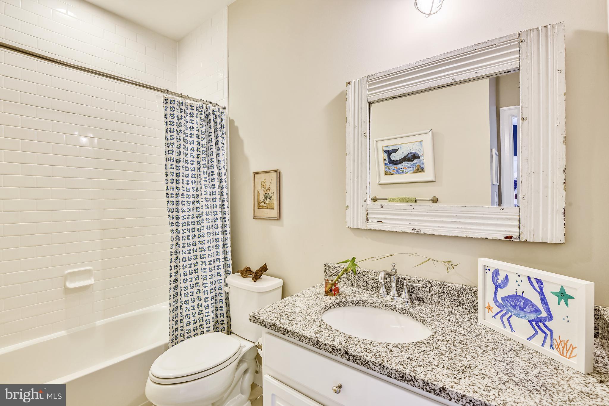 1013 Shore Acres Road Arnold, MD 21012 - Photo 31 of 67 Second Bedroom w/ ensuite bathroom- subway tile