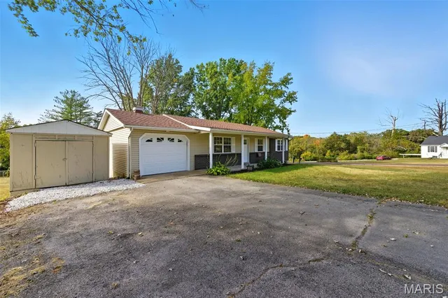 $265,000 | 49 El Sahara Drive, Cedar Hill, MO 63016