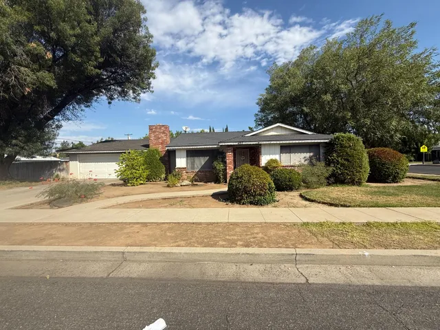 a front view of a house with a ocean view