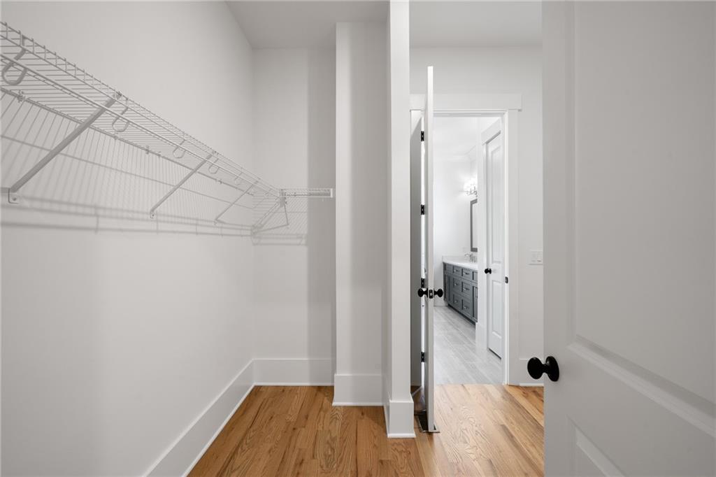 326 Reese Way Ball Ground, GA 30107 - Photo 18 of 37 a bathroom with a sink and a shower