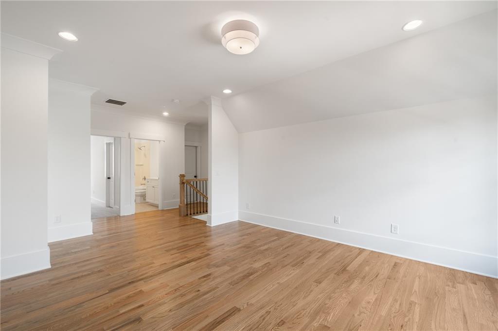 326 Reese Way Ball Ground, GA 30107 - Photo 22 of 37 a view of empty room with wooden floor