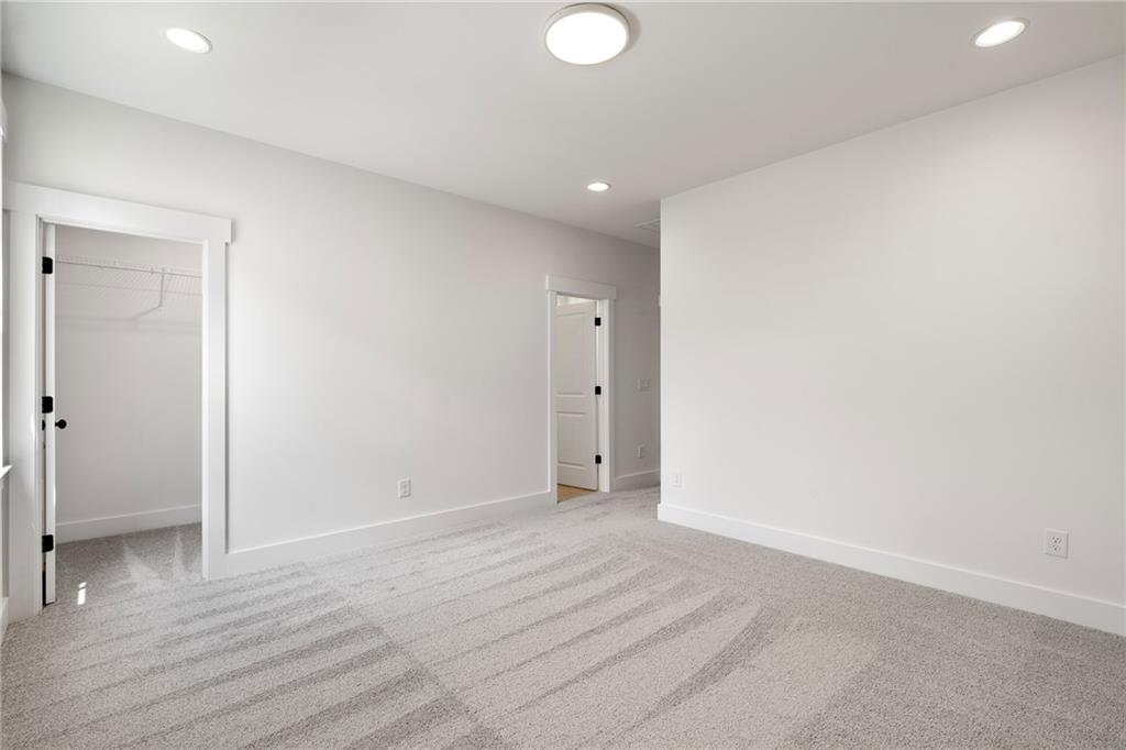 326 Reese Way Ball Ground, GA 30107 - Photo 23 of 37 a view of an empty room