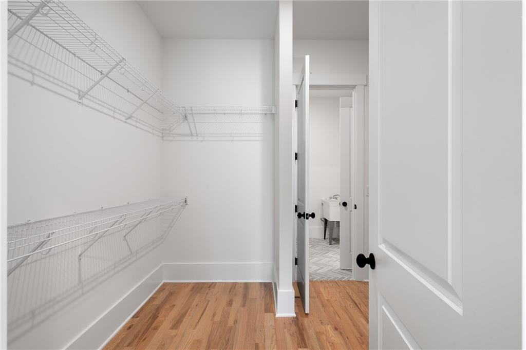 326 Reese Way Ball Ground, GA 30107 - Photo 28 of 37 a bathroom with a sink and shower